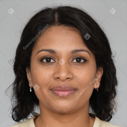 Joyful black young-adult female with medium  brown hair and brown eyes