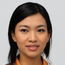 Joyful asian young-adult female with medium  black hair and brown eyes