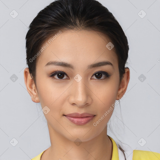 Joyful latino young-adult female with medium  brown hair and brown eyes