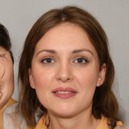 Joyful white young-adult female with medium  brown hair and brown eyes