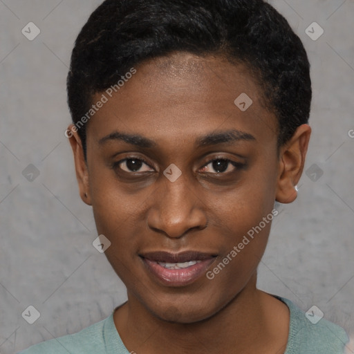 Joyful black young-adult female with short  brown hair and brown eyes