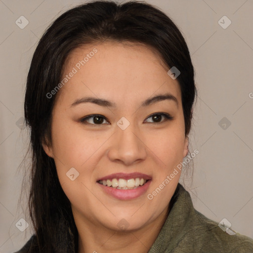 Joyful asian young-adult female with long  brown hair and brown eyes