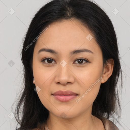 Joyful asian young-adult female with long  brown hair and brown eyes