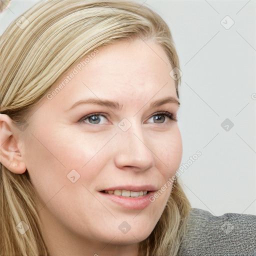 Joyful white young-adult female with long  brown hair and blue eyes