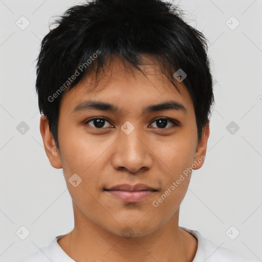 Joyful asian young-adult male with short  black hair and brown eyes