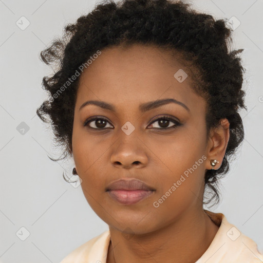 Neutral black young-adult female with short  brown hair and brown eyes