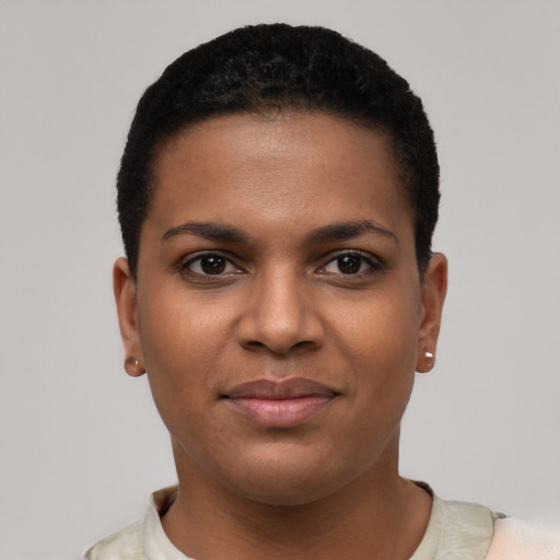Joyful black young-adult female with short  brown hair and brown eyes