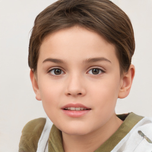 Joyful white child female with short  brown hair and brown eyes