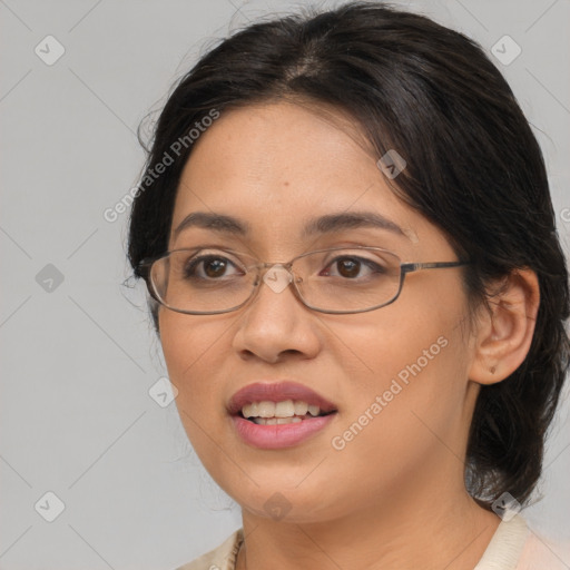 Joyful white adult female with medium  brown hair and brown eyes