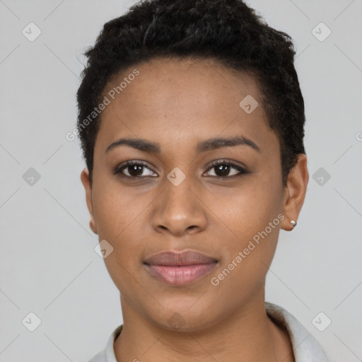 Joyful black young-adult female with short  brown hair and brown eyes