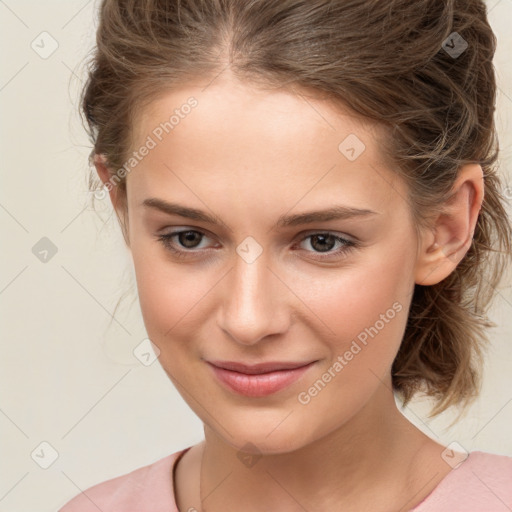 Joyful white child female with medium  brown hair and brown eyes