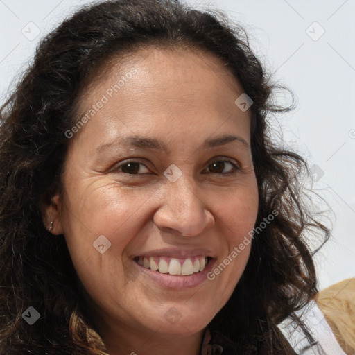 Joyful white adult female with long  brown hair and brown eyes