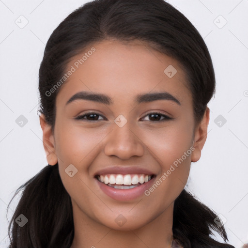 Joyful latino young-adult female with long  brown hair and brown eyes