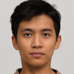 Neutral asian young-adult male with short  brown hair and brown eyes