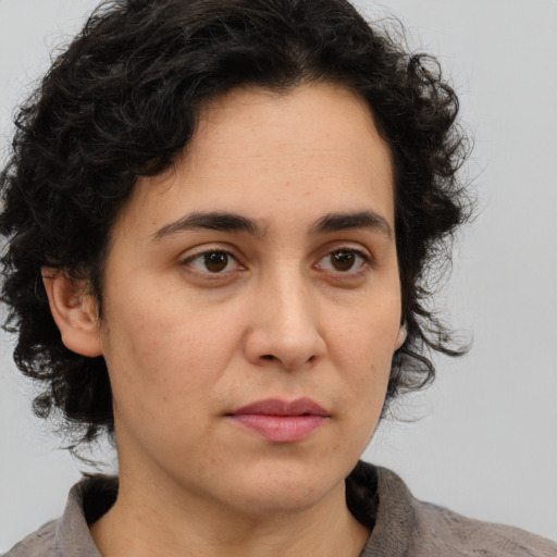 Neutral white adult female with medium  brown hair and brown eyes