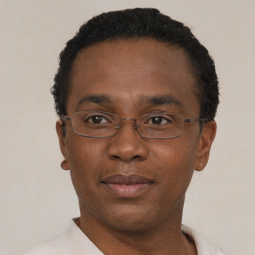 Neutral black adult male with short  black hair and brown eyes
