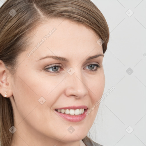 Joyful white young-adult female with long  brown hair and grey eyes