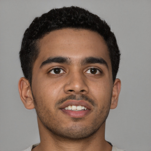 Neutral latino young-adult male with short  brown hair and brown eyes