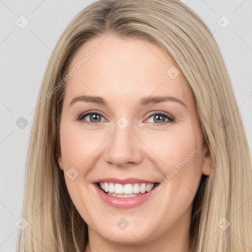 Joyful white young-adult female with long  brown hair and grey eyes