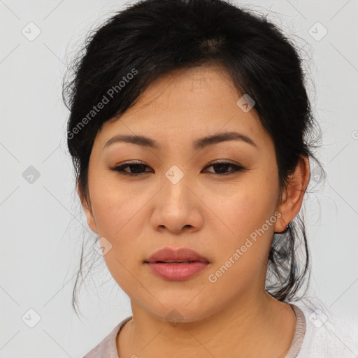 Joyful asian young-adult female with medium  black hair and brown eyes