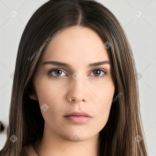 Neutral white young-adult female with long  brown hair and brown eyes