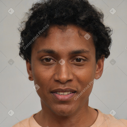 Joyful black young-adult male with short  black hair and brown eyes