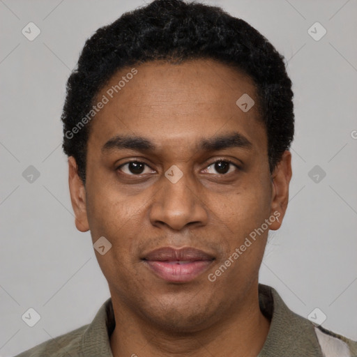 Joyful black young-adult male with short  black hair and brown eyes