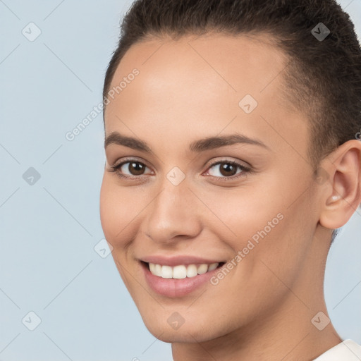 Joyful white young-adult female with short  brown hair and brown eyes