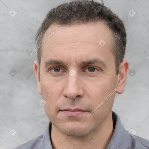 Neutral white adult male with short  brown hair and brown eyes