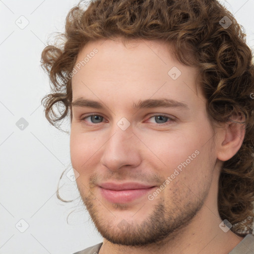 Joyful white young-adult male with medium  brown hair and brown eyes