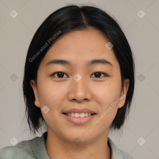 Joyful asian young-adult female with medium  black hair and brown eyes