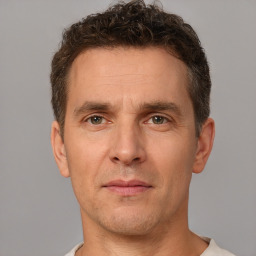 Neutral white adult male with short  brown hair and brown eyes