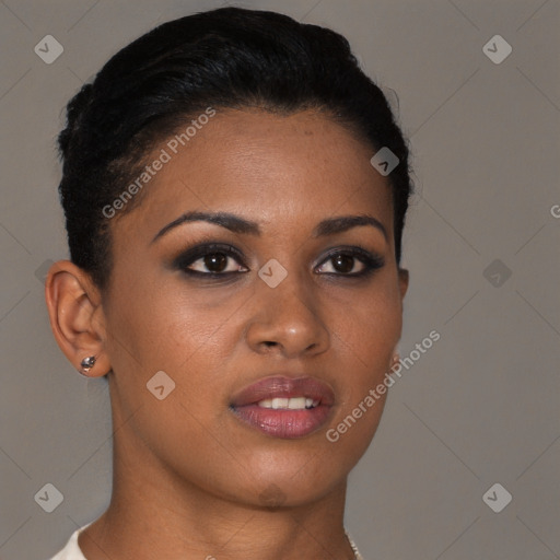 Joyful black young-adult female with short  brown hair and brown eyes