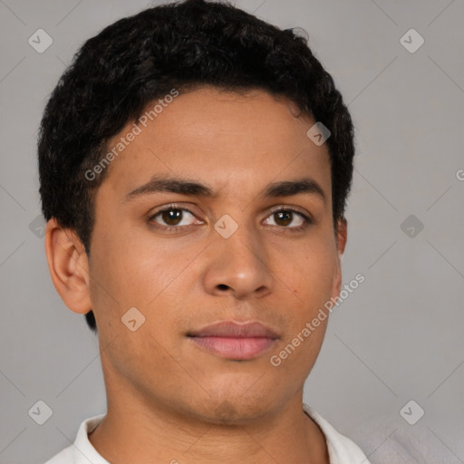 Neutral latino young-adult male with short  brown hair and brown eyes
