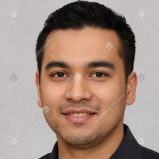 Joyful white young-adult male with short  black hair and brown eyes