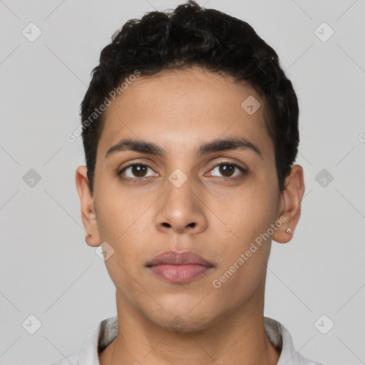 Neutral latino young-adult male with short  black hair and brown eyes