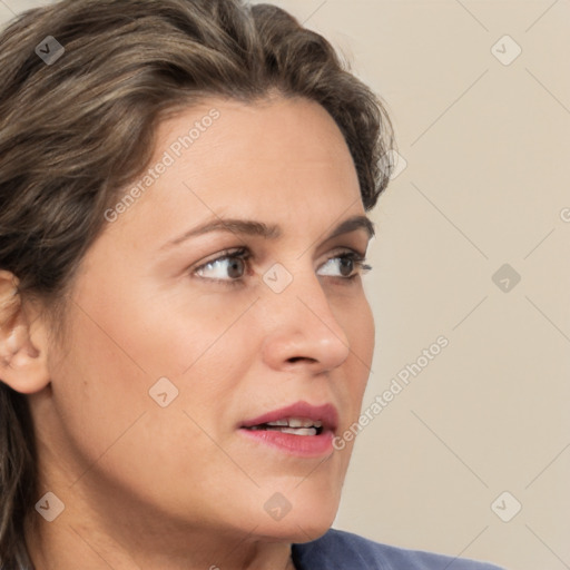 Neutral white young-adult female with medium  brown hair and brown eyes