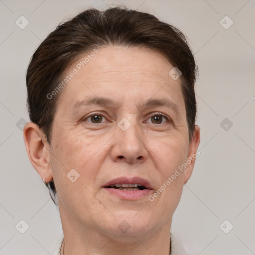 Joyful white adult female with short  brown hair and brown eyes