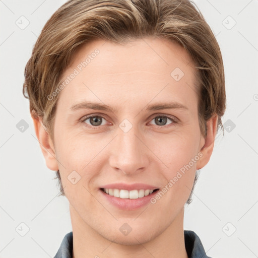 Joyful white young-adult female with short  brown hair and grey eyes