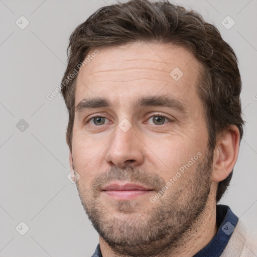 Neutral white adult male with short  brown hair and brown eyes