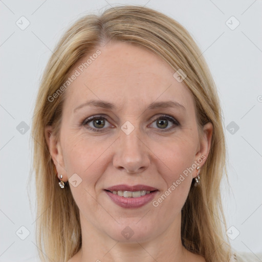 Joyful white adult female with medium  brown hair and grey eyes