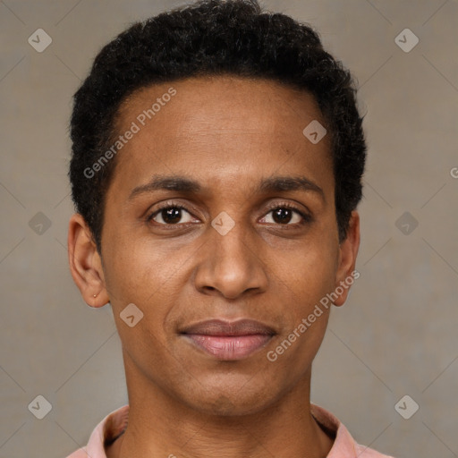 Joyful latino young-adult male with short  brown hair and brown eyes