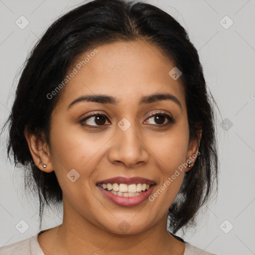 Joyful latino young-adult female with medium  brown hair and brown eyes