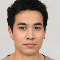 Neutral asian young-adult male with short  black hair and brown eyes