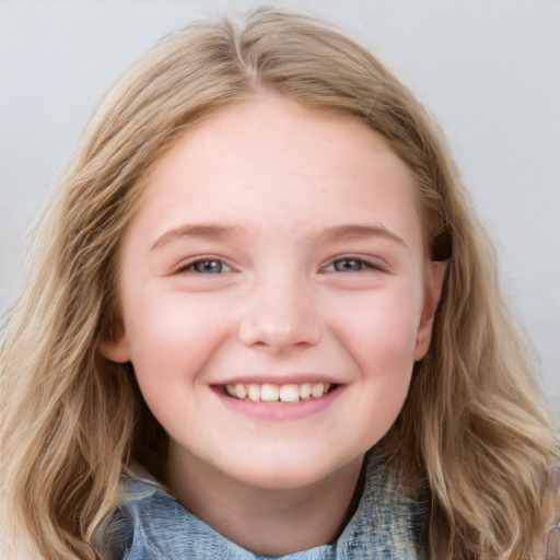 Joyful white child female with long  brown hair and blue eyes