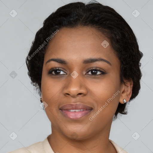 Joyful black young-adult female with medium  black hair and brown eyes