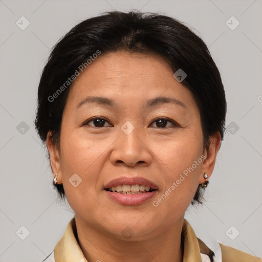 Joyful white adult female with medium  brown hair and brown eyes