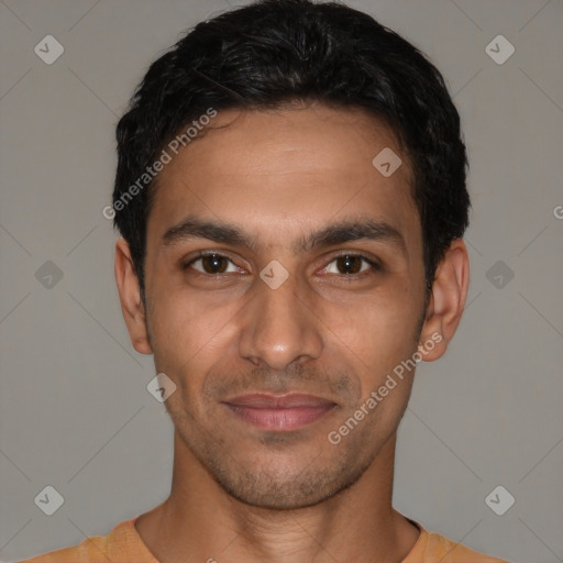 Joyful latino young-adult male with short  black hair and brown eyes