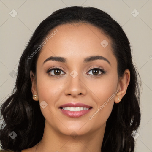 Joyful latino young-adult female with long  black hair and brown eyes