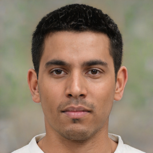 Neutral latino young-adult male with short  black hair and brown eyes